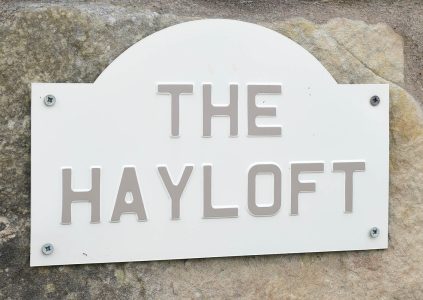 The Hayloft sign at Woodside in Fife