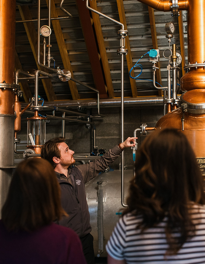 The distilling process being explained on a Darnley's Gin tour